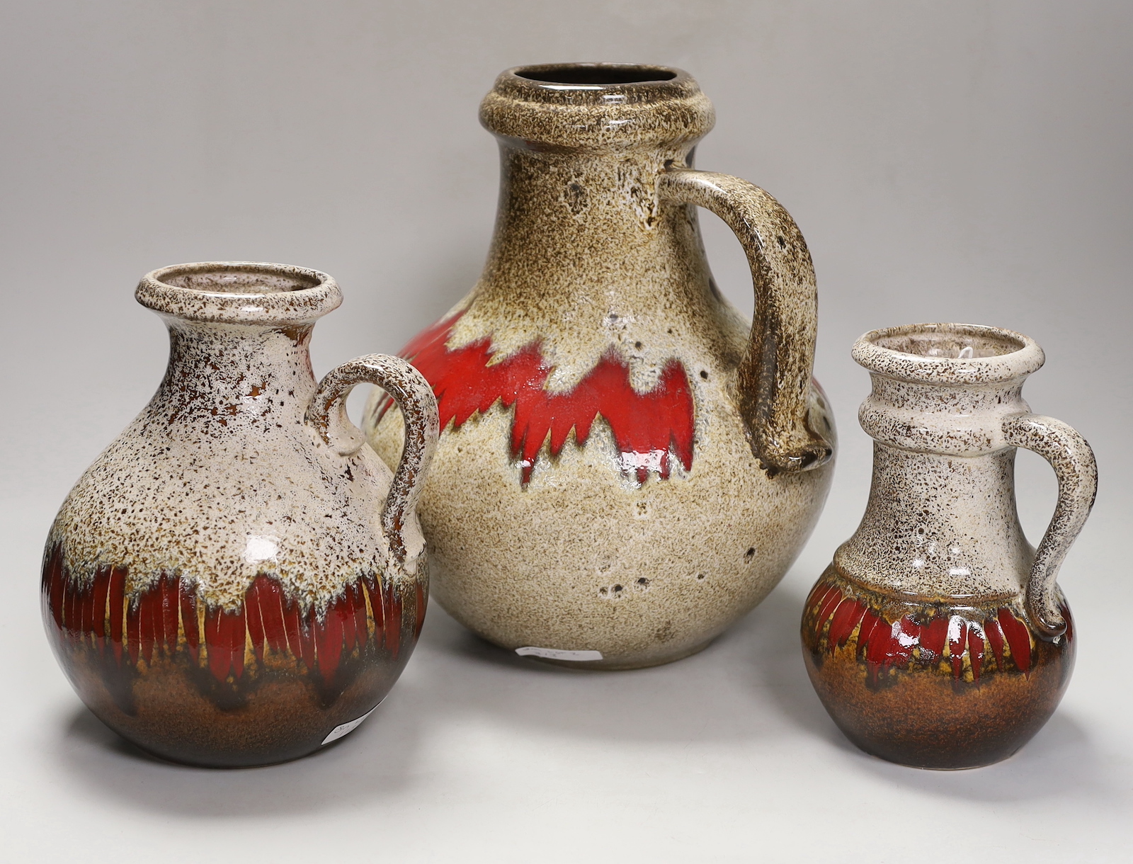 Two Scheurich Keramik jugs and a vase, tallest jug 28cm high